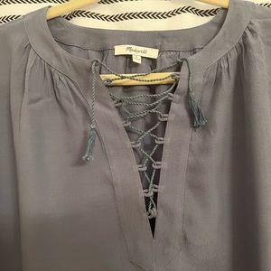 Blue blouses with lace up detail